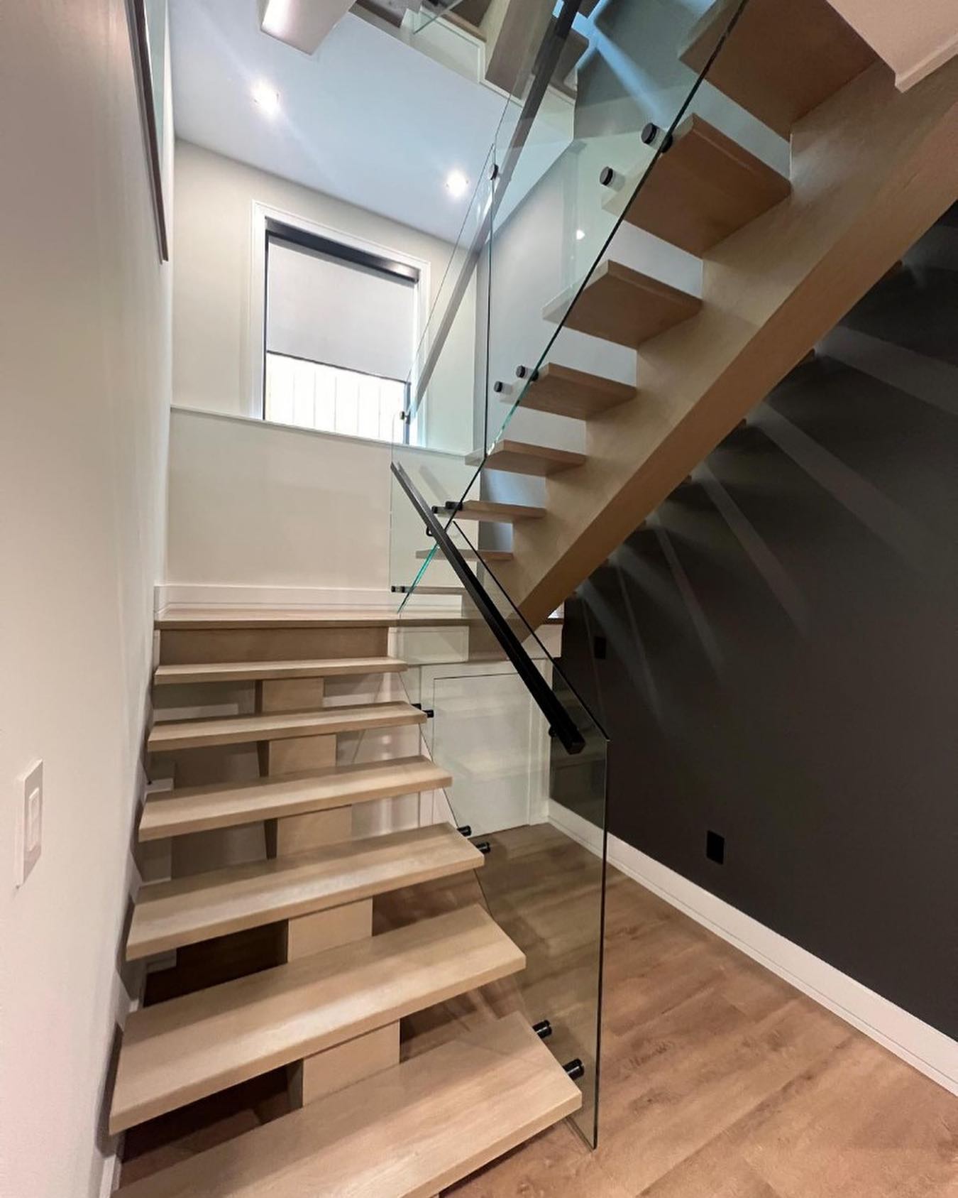 Floating Staircase with Glass Side Panels
